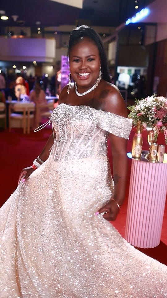 Guest in a sparkling white ball gown at Basadi in Music, filmed by the Crown Concepts GlamBot®